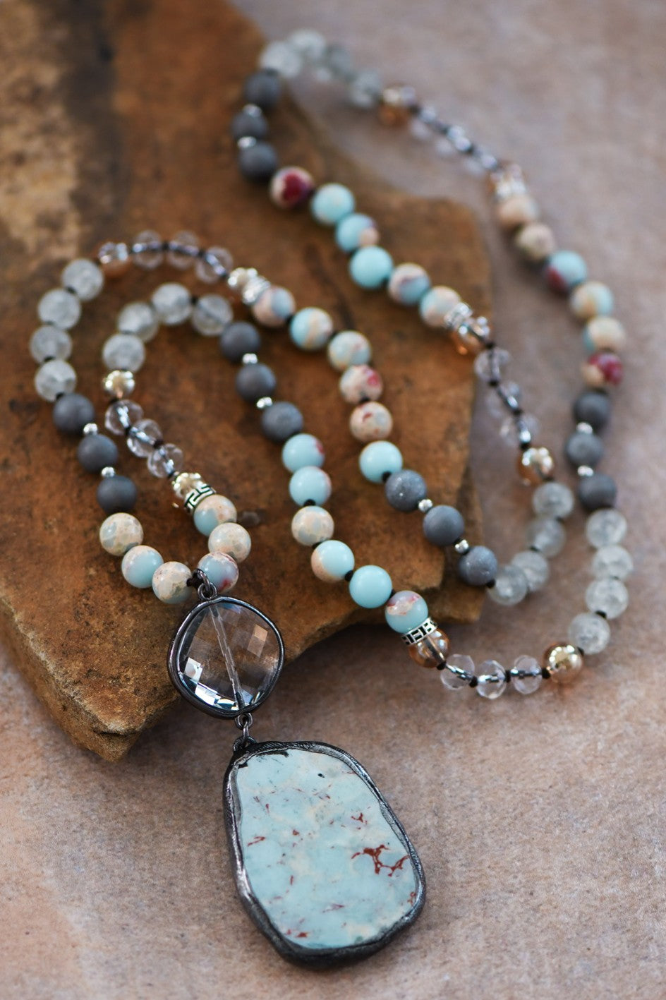 32" natural stone bead necklace with semi-precious pendant, featuring mixed stone detailing.