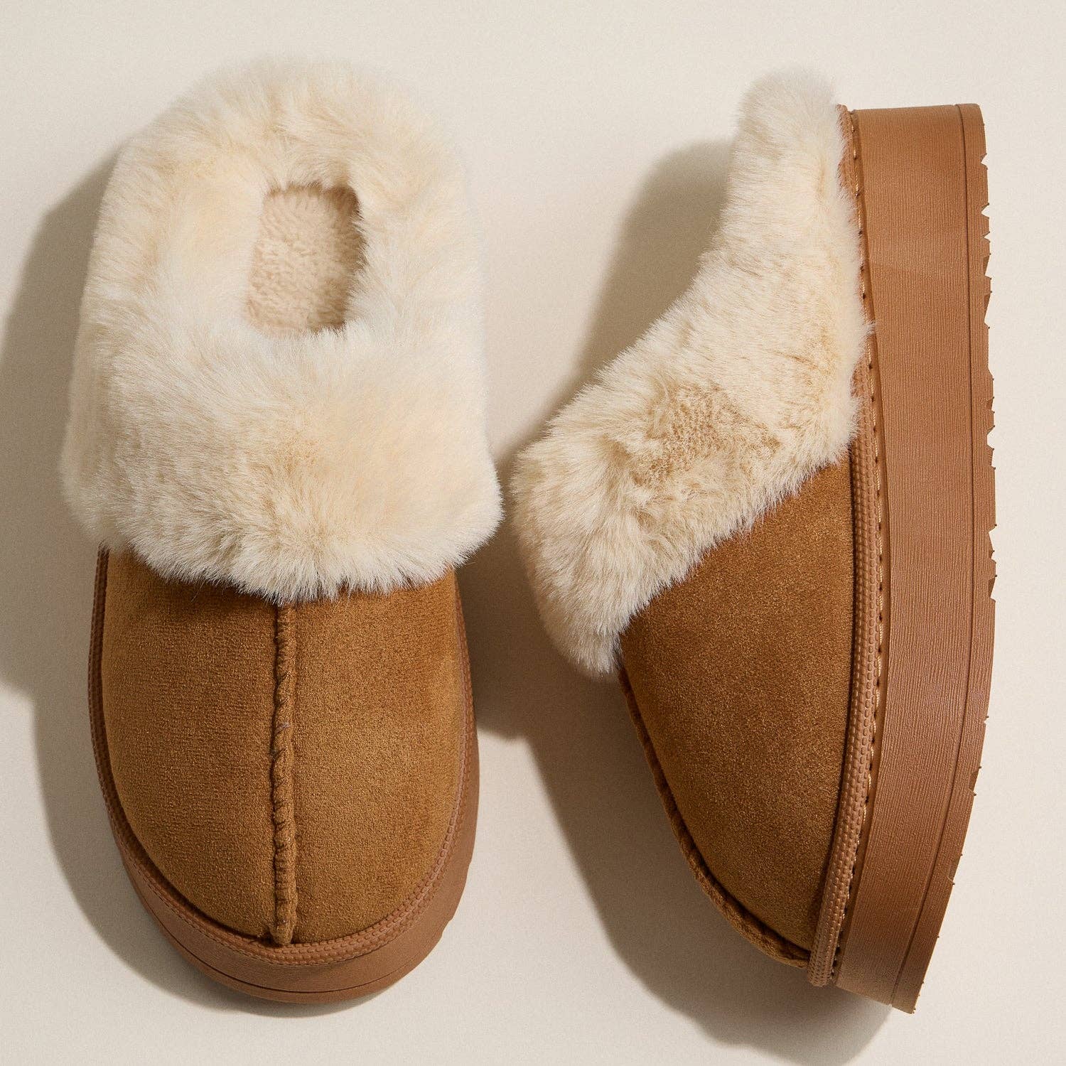 Camel faux suede platform slippers with sherpa lining and faux fur trim.