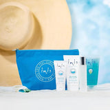 Aqua blue cotton cosmetic bag holding four travel-size Inis products: cologne, hand cream, shower gel, and body lotion.