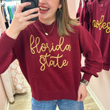 Garnet mock-neck sweater with “Florida State” embroidered in gold rope script across the front
