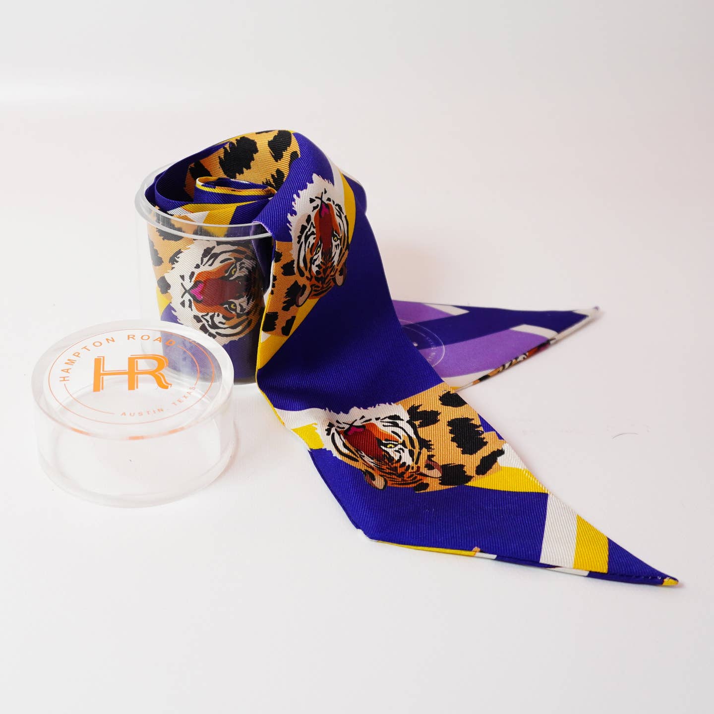 Colorful scarf with tiger design on a white background