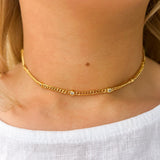 Delicate gold choker with sparkling cubic zirconia accents—elegant, dainty, and perfect for layering or wearing solo.