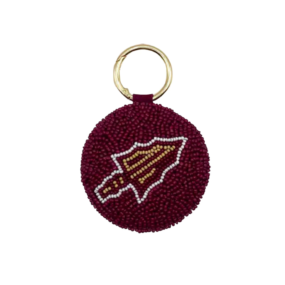 Maroon keychain with a logo