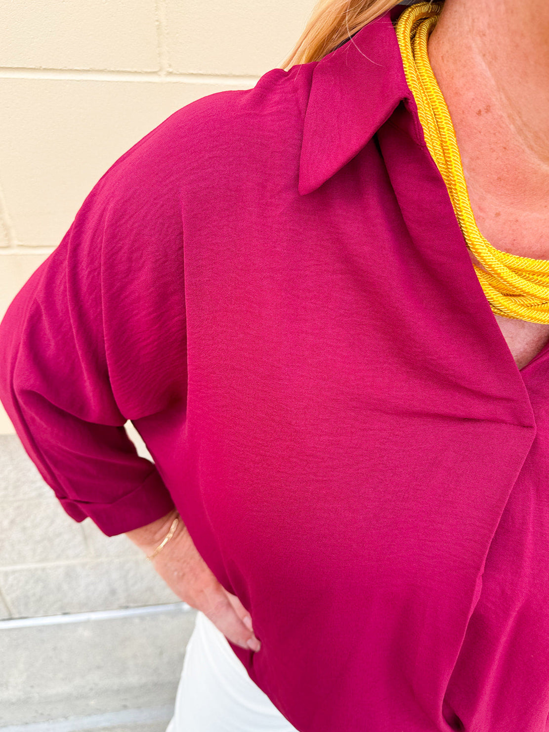 Garnet 3/4 sleeve collared blouse with cuffed sleeves, perfect for game day
