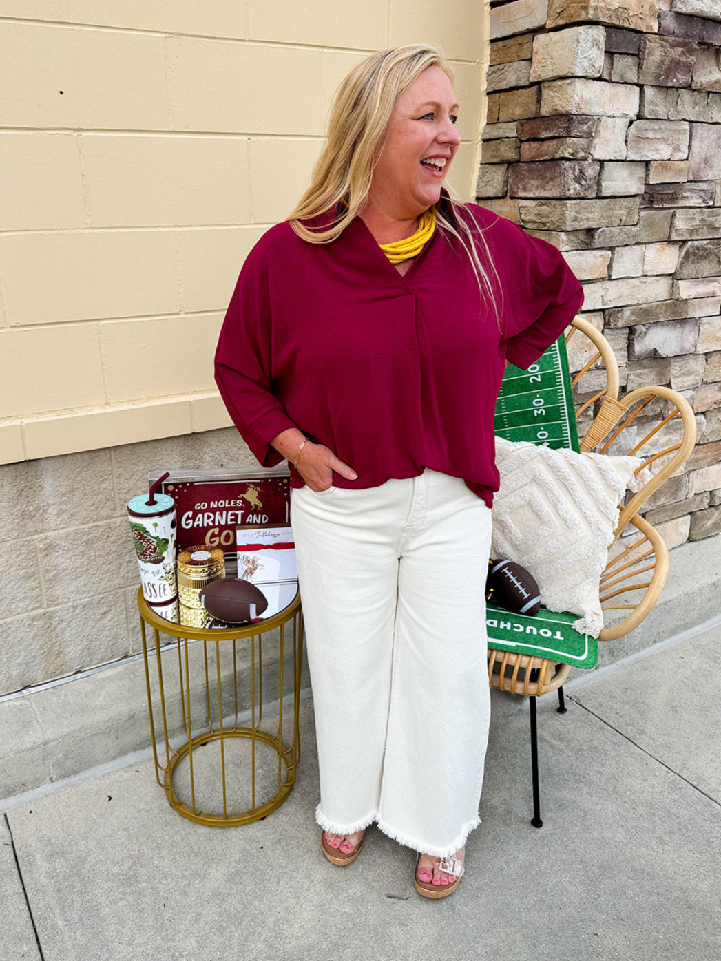 Garnet 3/4 sleeve collared blouse with cuffed sleeves, perfect for game day