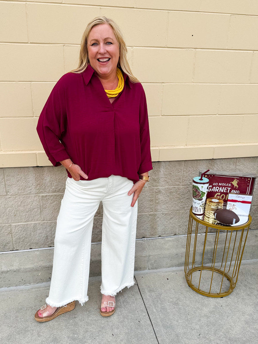 Garnet 3/4 sleeve collared blouse with cuffed sleeves, perfect for game day