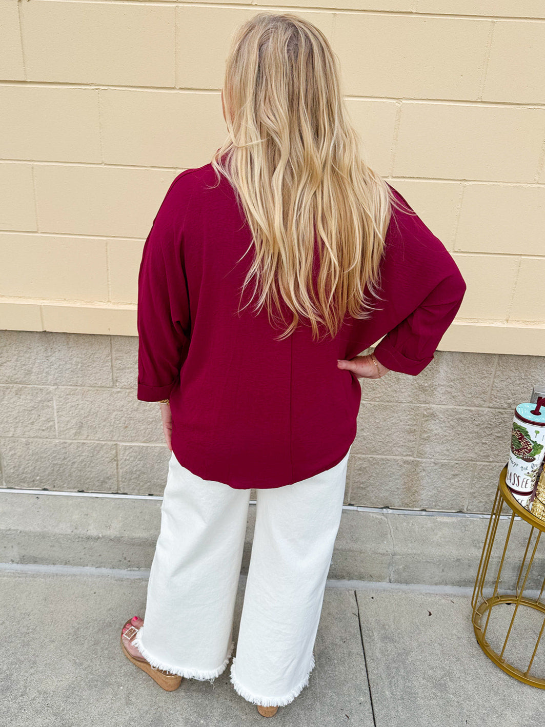 Garnet 3/4 sleeve collared blouse with cuffed sleeves, perfect for game day