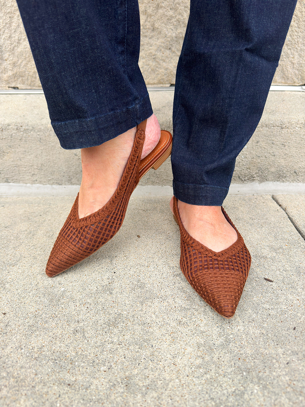 Coffee brown crochet knit slingback flats with pointed toe and leather sole.
