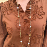 32-inch textured gold oval link necklace with clear crystals and pearls.