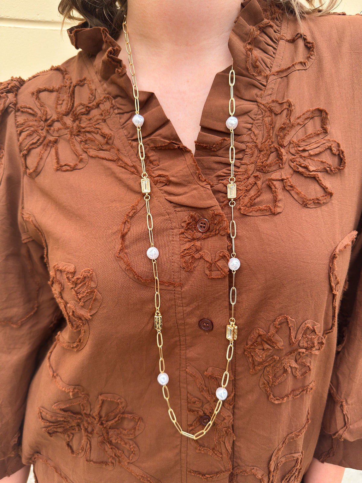 32-inch textured gold oval link necklace with clear crystals and pearls.