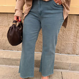 Teal acid wash high-waisted bootcut jeans with frayed hem