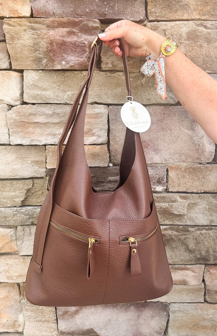 Chocolate slouchy hobo bag with double front zippers and gold hardware