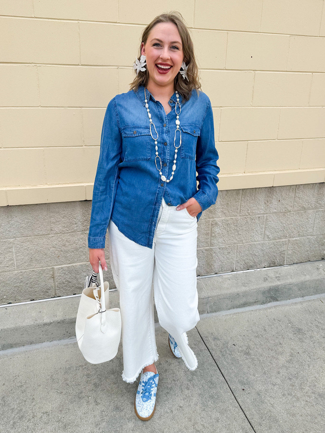 Light chambray button-down shirt with collar and chest pockets