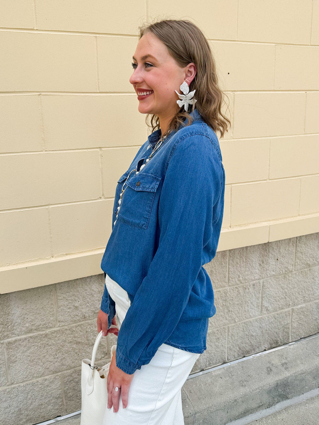 Light chambray button-down shirt with collar and chest pockets