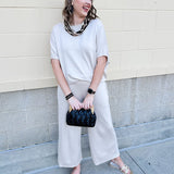 Midnight Market Woven Clutch in Black