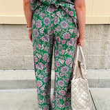 Floral paisley wide-leg pull-on pants in green and pink with contrast side stripe and elastic waist—lightweight and breezy fit
