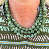 Olive chunky triple-layer bead necklace with faux leather cords and matching magnetic clasp.