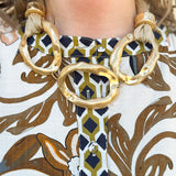 Short hammered metal link necklace with mesh scarf detail and adjustable clasp.