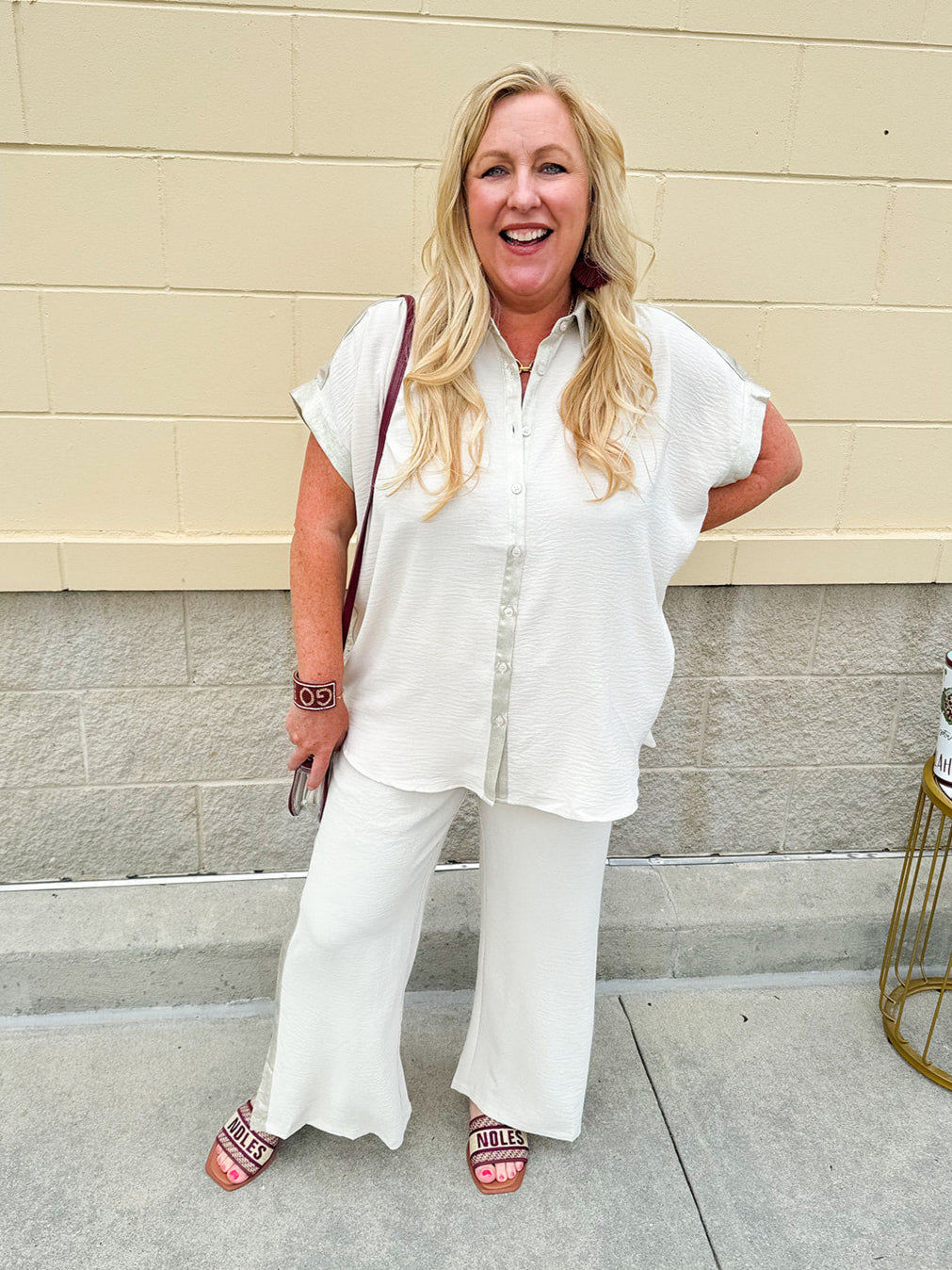 Oatmeal wide leg pants with gold side piping and drawstring waist