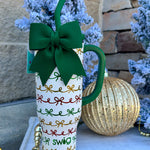 Ivory glitter 30oz insulated mug with red, green, and gold metallic bows and removable bow accent.
