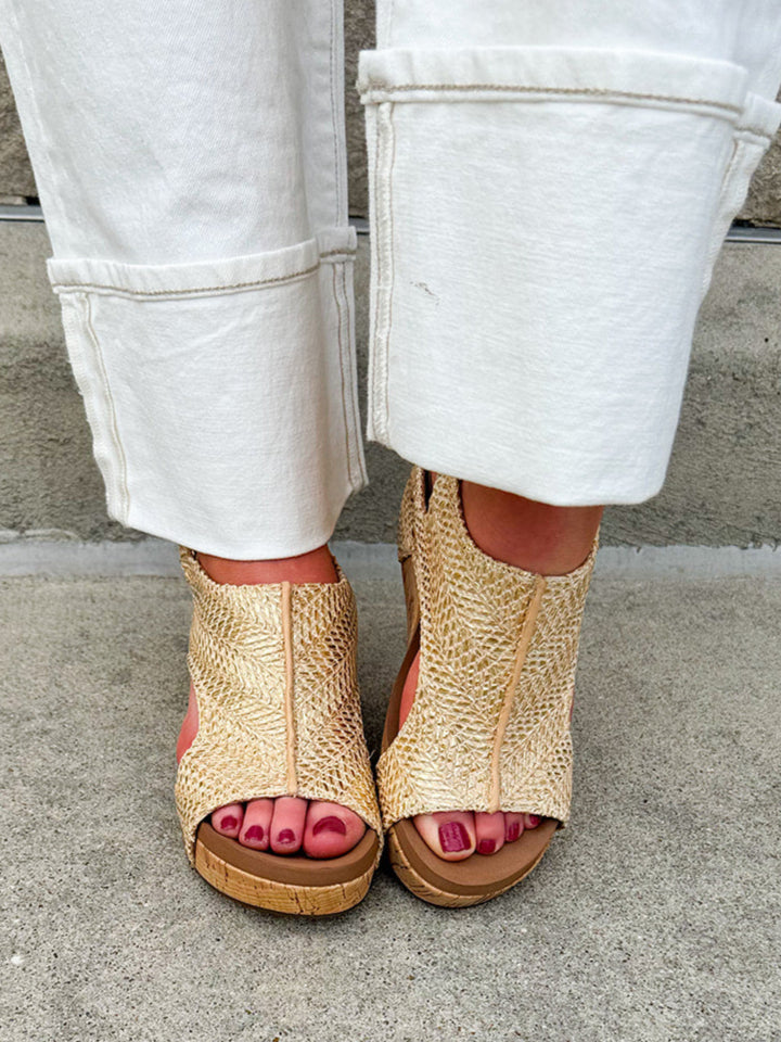 Light gold raffia cork wedges with gold rivets, Velcro heel strap, and a cushioned footbed