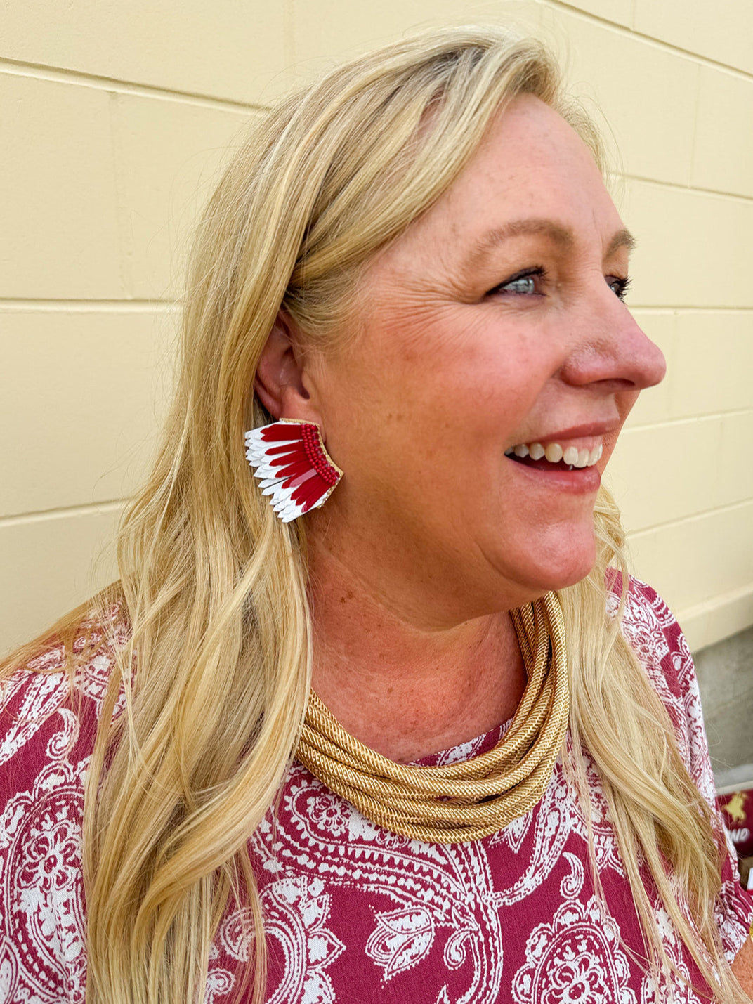 Garnet and white feather-inspired earrings with layered plastic design and beaded side detailing—lightweight and perfect for Gameday.