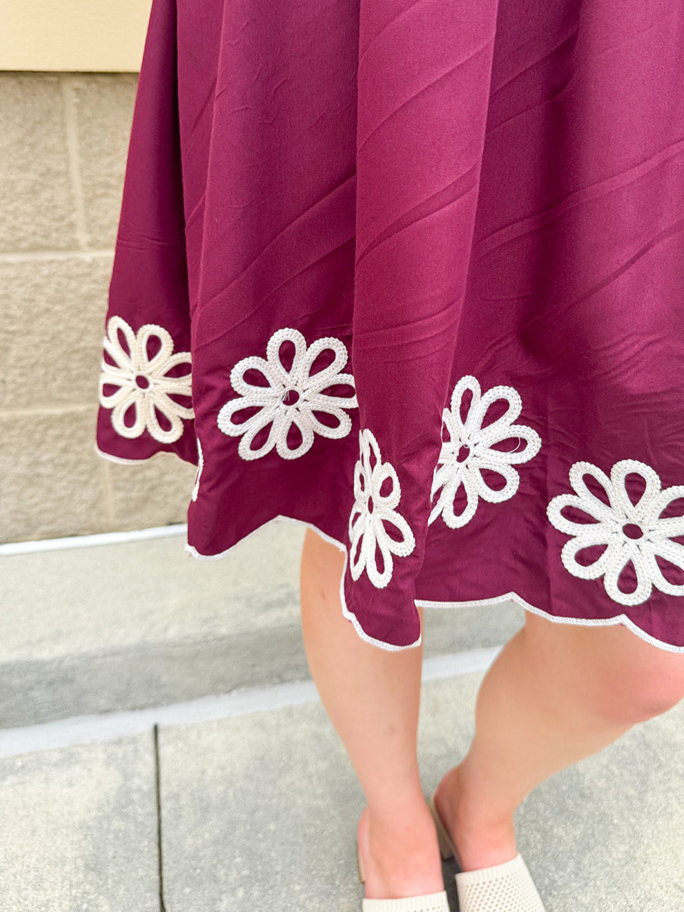 Garnet embroidered mini dress with puff sleeves, square neck, floral detailing, and scalloped hem—perfect for FSU gameday
