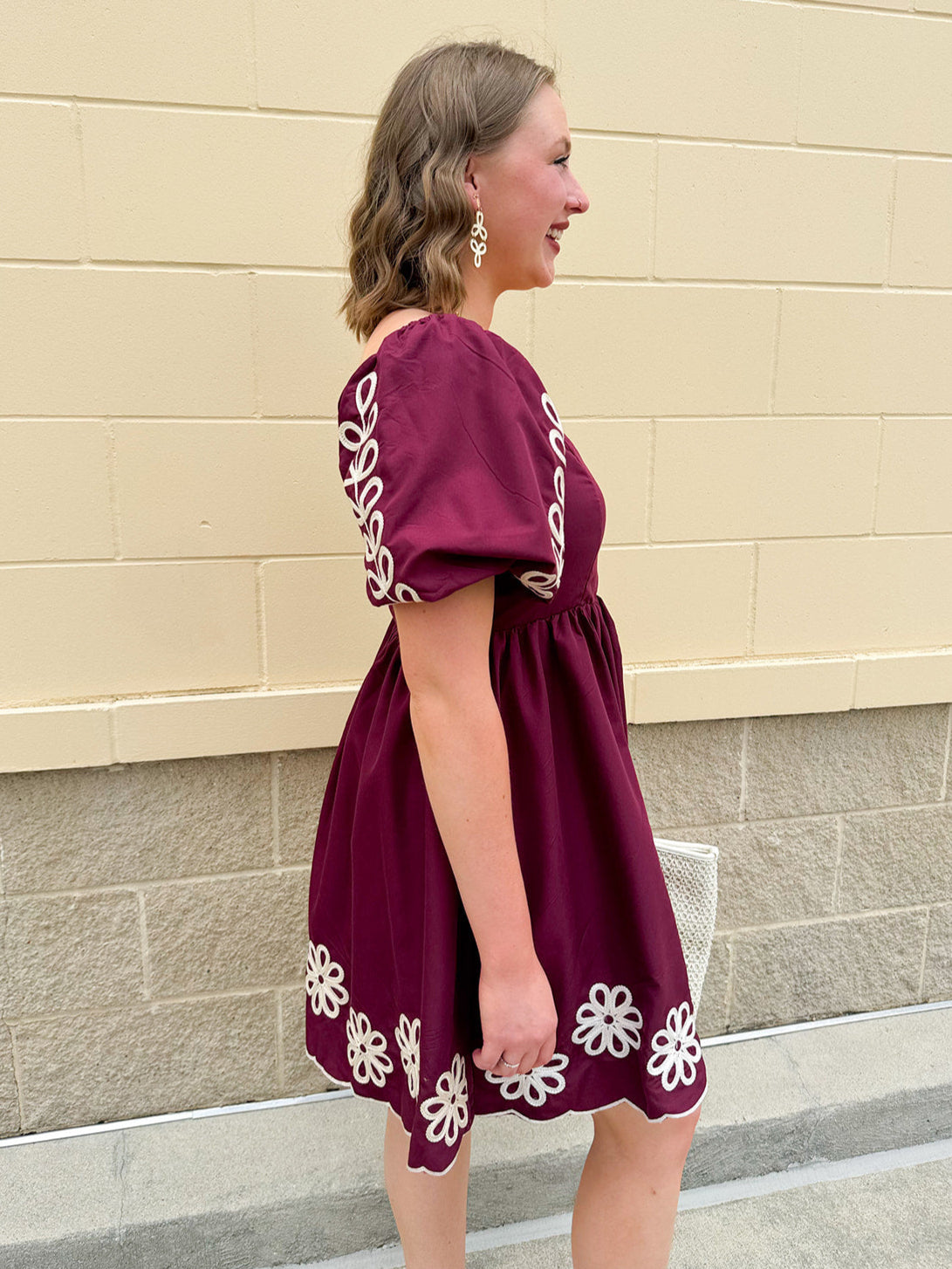 Garnet embroidered mini dress with puff sleeves, square neck, floral detailing, and scalloped hem—perfect for FSU gameday
