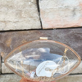 Clear Football shaped Stadium Purse with gold chain.
