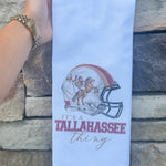 White cotton kitchen towel with painted football helmet featuring Osceola and Renegade, no border or edging.