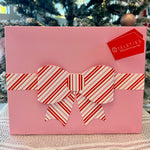 TELETIES Advent Calendar featuring 12 holiday surprises including hair clips and nylon hair ties.