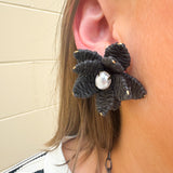 Black raffia flower earrings with pearl bead centers—lightweight, woven, and perfect for elegant everyday style.
