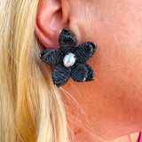 Black raffia flower earrings with pearl bead centers—lightweight, woven, and perfect for elegant everyday style.