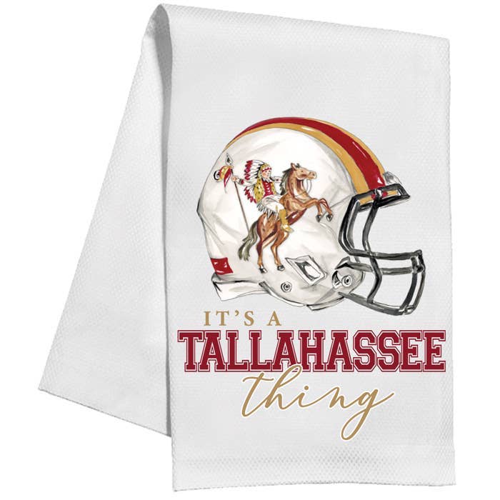 White cotton kitchen towel with painted football helmet featuring Osceola and Renegade, no border or edging.
