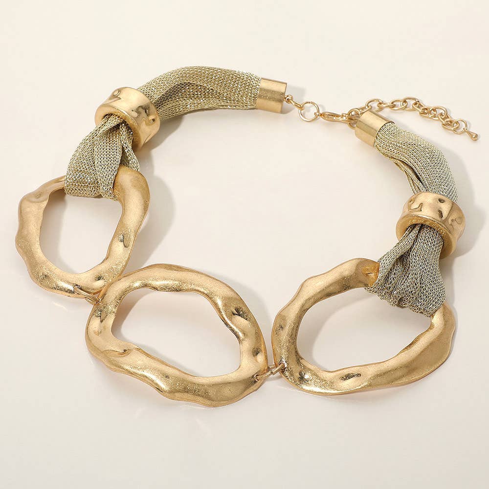 Short hammered metal link necklace with mesh scarf detail and adjustable clasp.