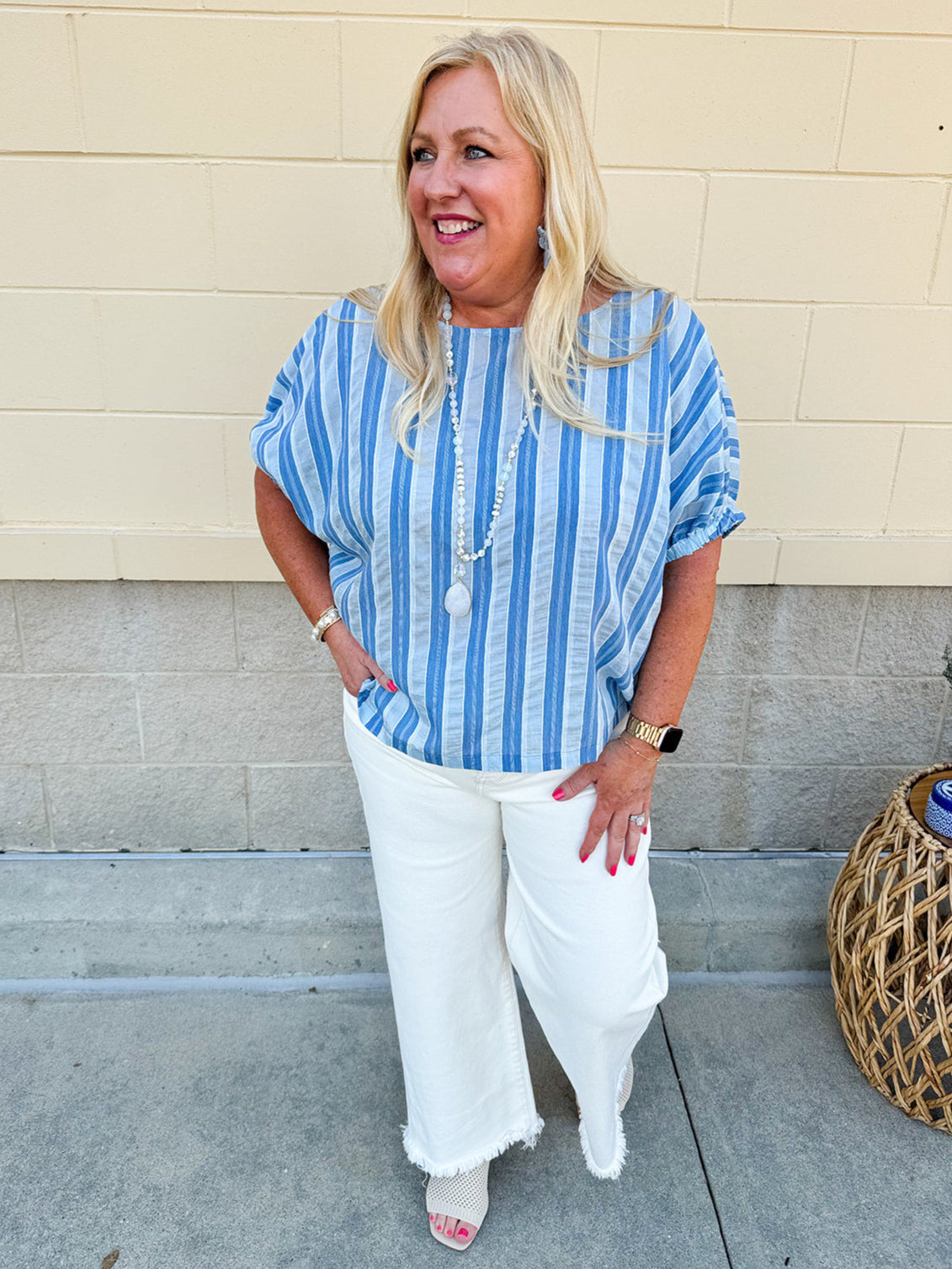 Model wearing the Picnic Chic Round Neck Striped Top featuring dolman sleeves, elastic cuffs, and a slightly boxy silhouette – styled for an effortless summer look perfect for picnics and casual outings