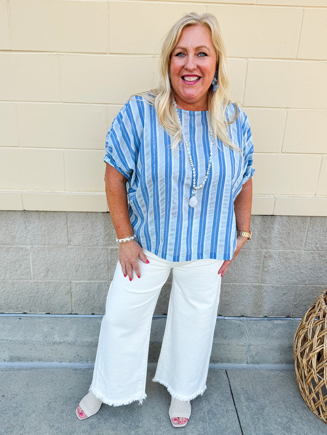 Model wearing the Picnic Chic Round Neck Striped Top featuring dolman sleeves, elastic cuffs, and a slightly boxy silhouette – styled for an effortless summer look perfect for picnics and casual outings