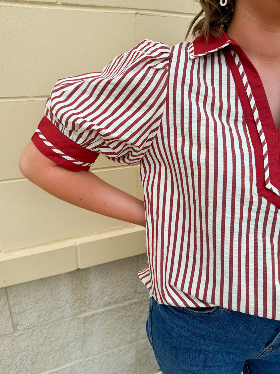 Rust and cream striped pullover top with puff sleeves, contrast rust cuffs and split collar—lightweight and perfect for early fall