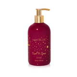 Capri Blue Tinsel & Spice Hand Wash in garnet bottle with gold flecks.