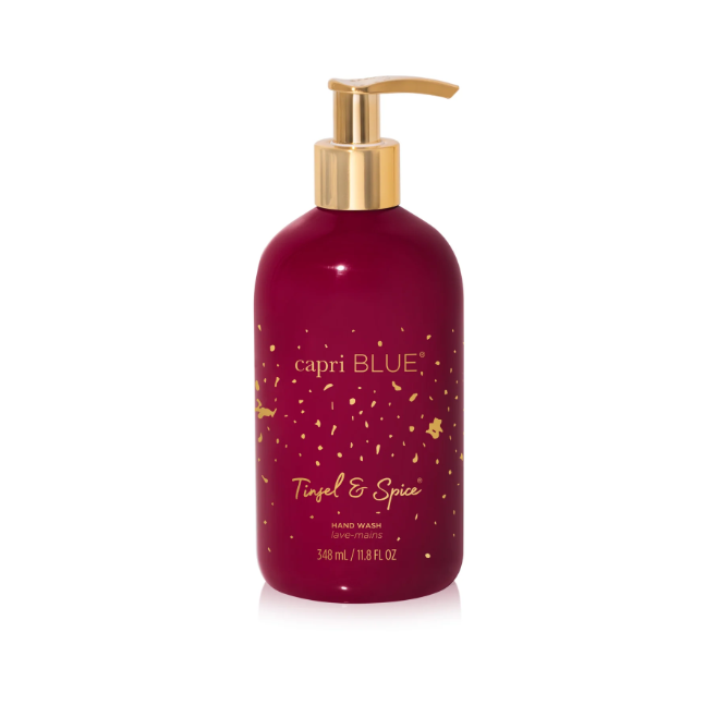 Capri Blue Tinsel & Spice Hand Wash in garnet bottle with gold flecks.