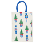 White wine caddy with nutcracker and Christmas tree print, blue handles.