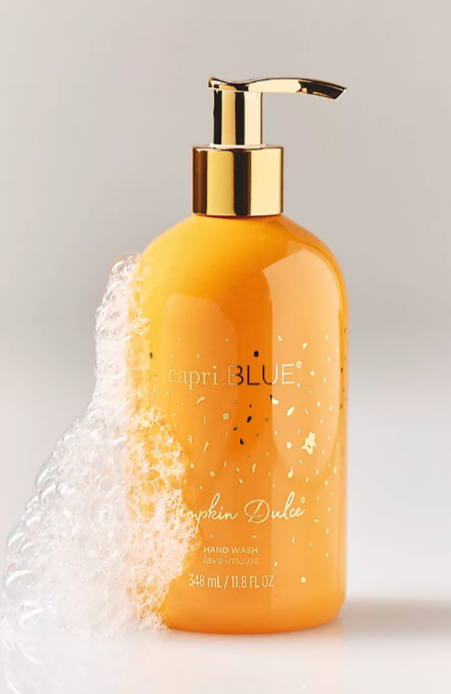 Orange pump hand wash with gold detailing, fall-inspired design