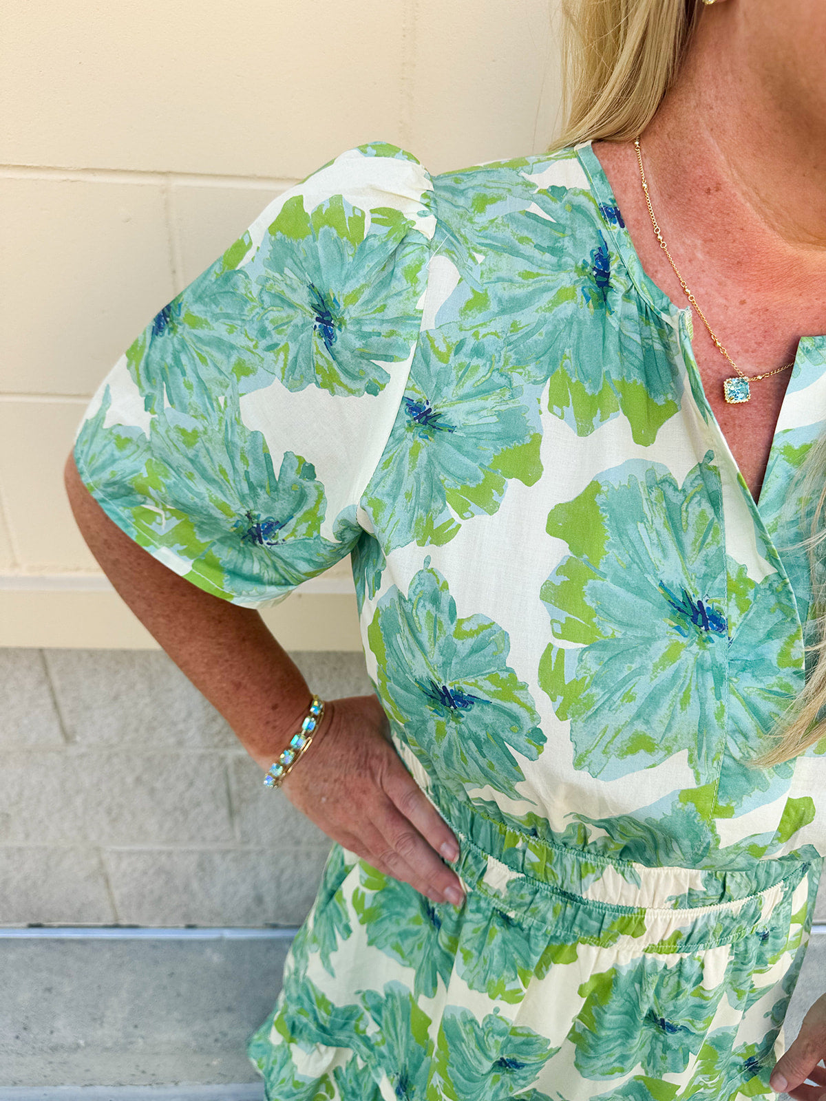 Midi-length dress with half sleeves, pintuck details, and a flattering elastic waist, designed in a lightweight fabric for summer styling