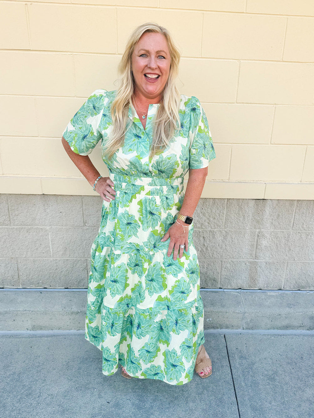 Midi-length dress with half sleeves, pintuck details, and a flattering elastic waist, designed in a lightweight fabric for summer styling
