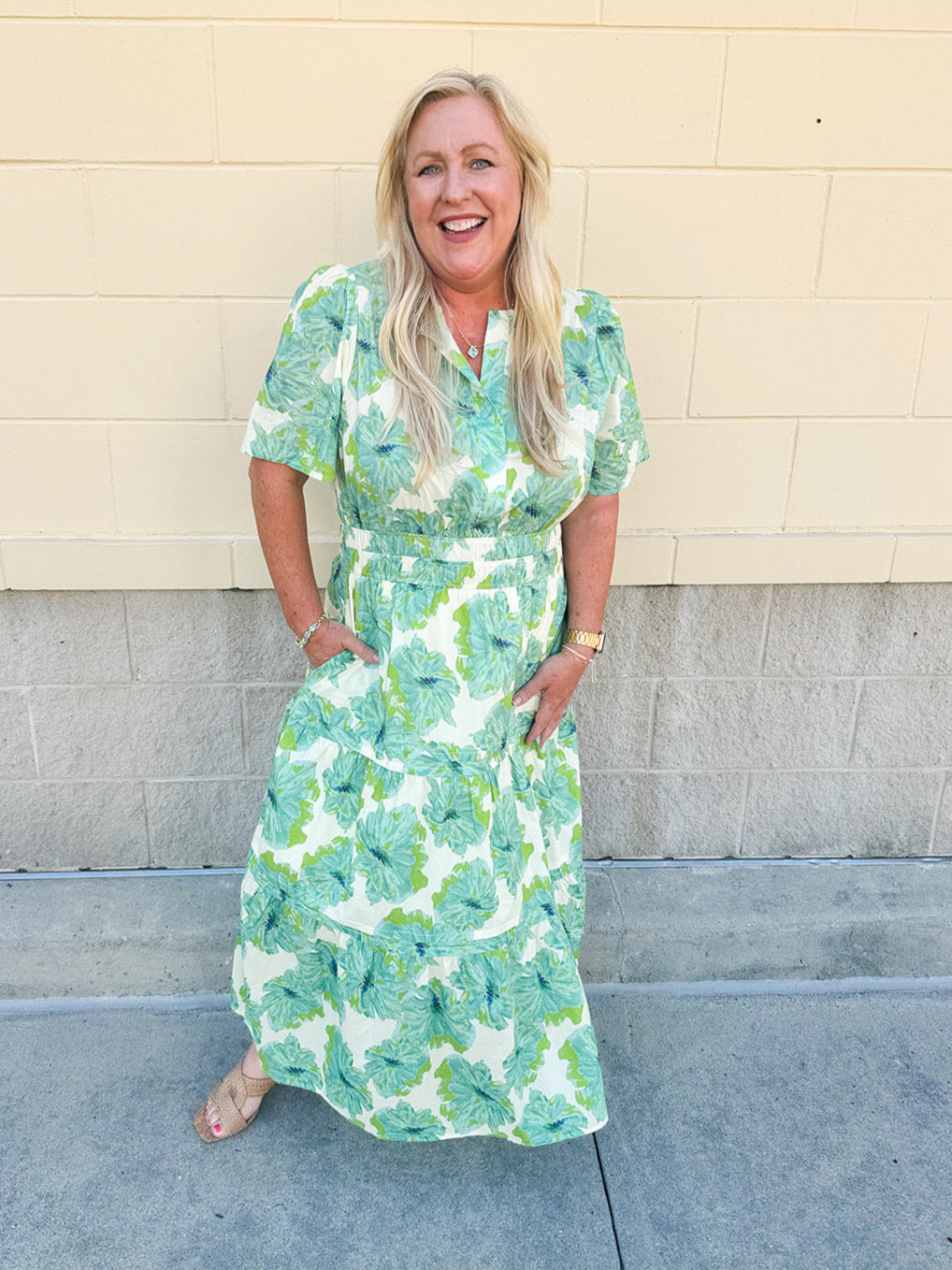 Midi-length dress with half sleeves, pintuck details, and a flattering elastic waist, designed in a lightweight fabric for summer styling