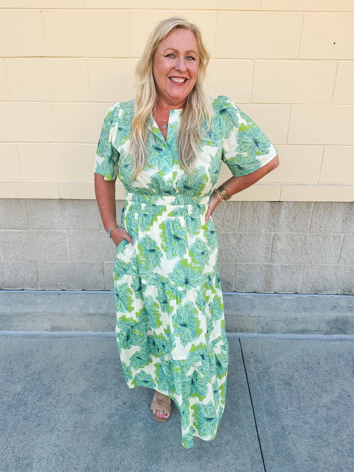 Midi-length dress with half sleeves, pintuck details, and a flattering elastic waist, designed in a lightweight fabric for summer styling