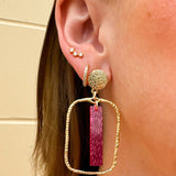 Rectangular hammered gold hoop earrings with transparent hot pink acrylic stick drop, designed by Taylor Shaye.