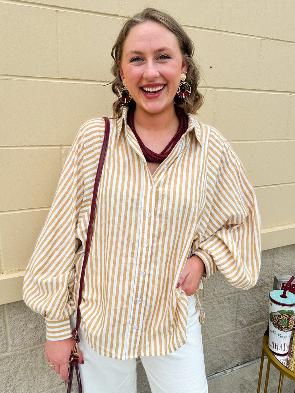 Tan and off-white striped long sleeve button-down shirt with collared neckline and cuffed sleeves—lightweight and perfect for layering