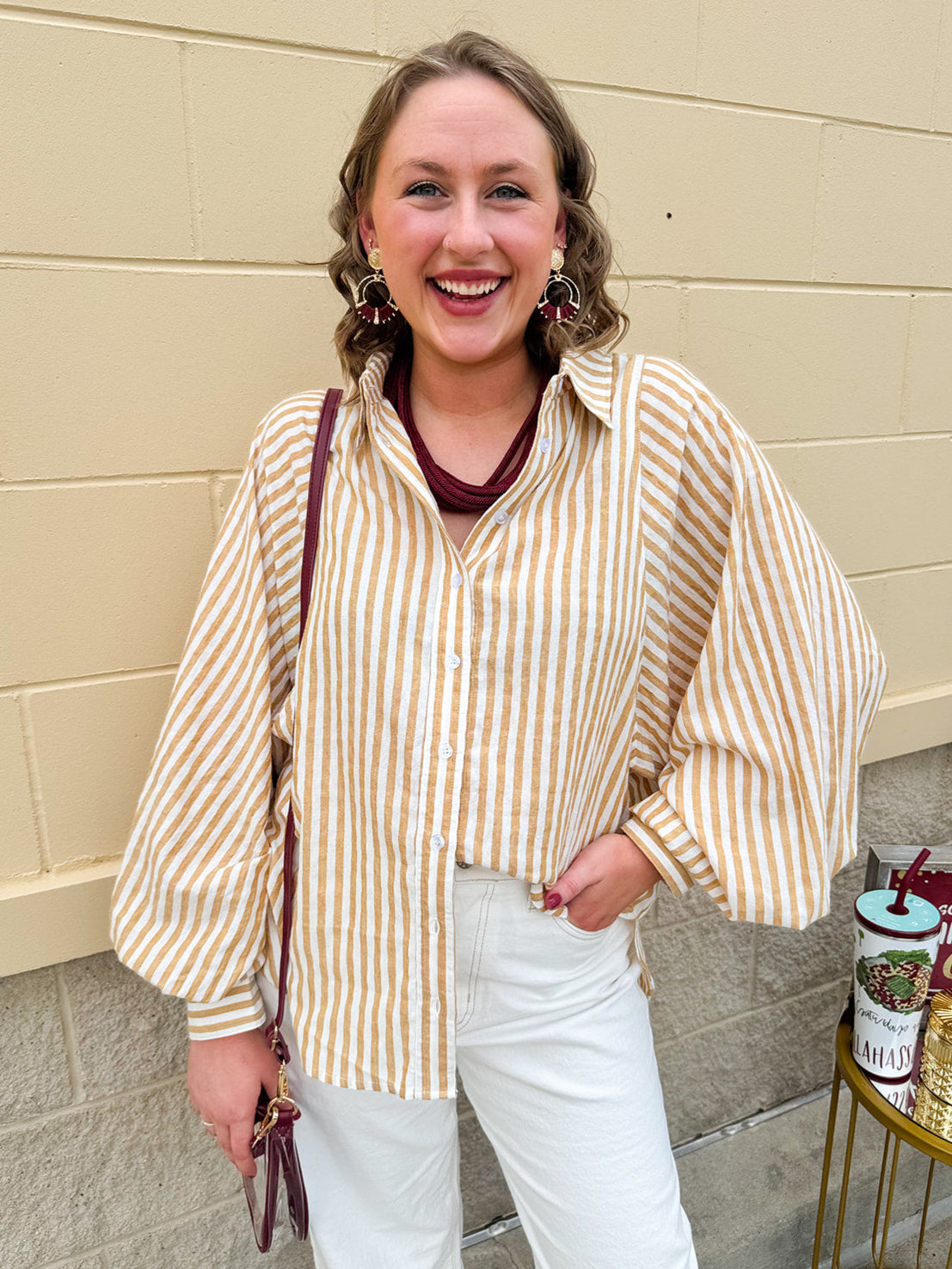 Tan and off-white striped long sleeve button-down shirt with collared neckline and cuffed sleeves—lightweight and perfect for layering