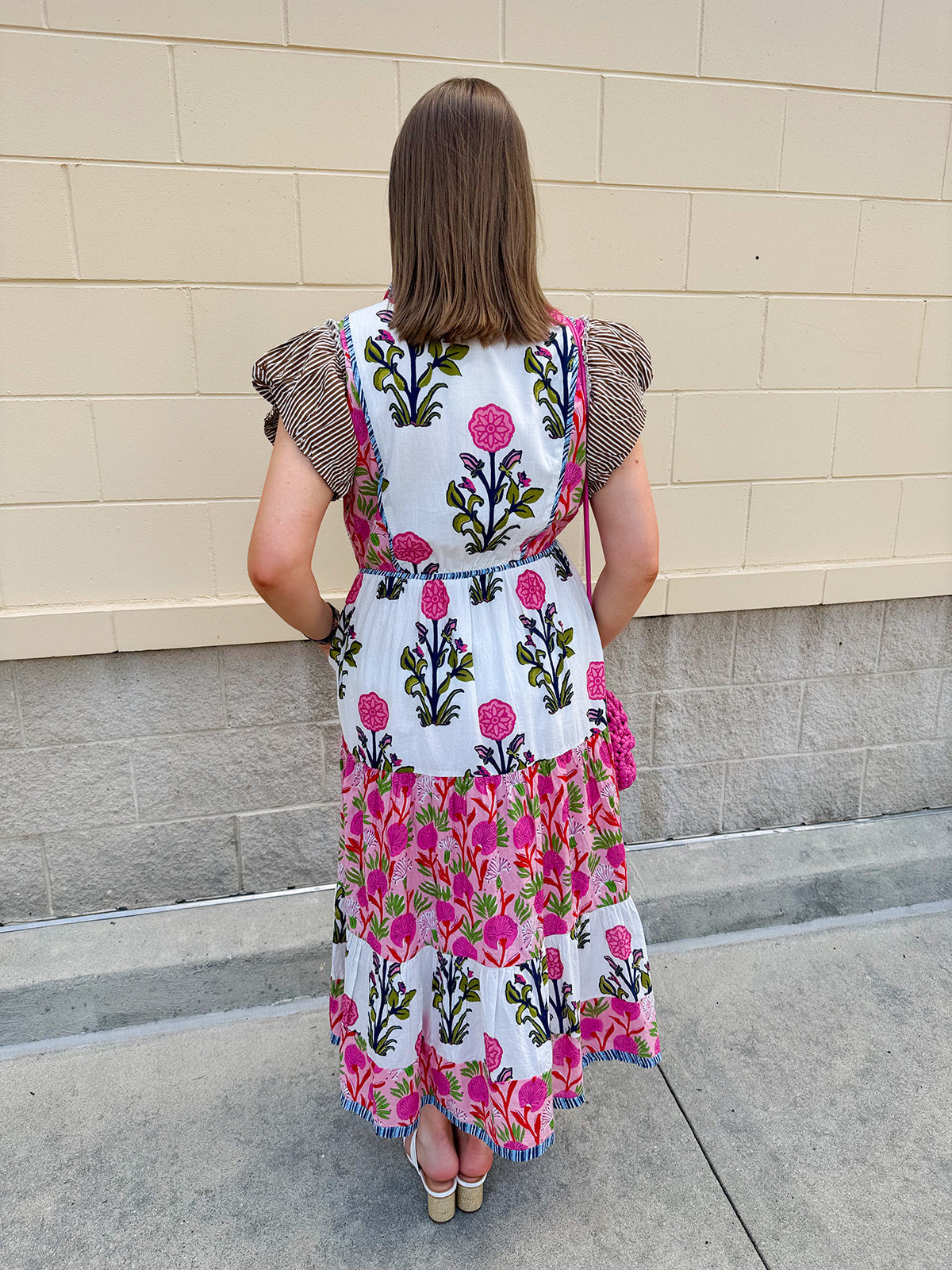 White cotton floral tiered maxi dress with flutter sleeves and ruffle collar